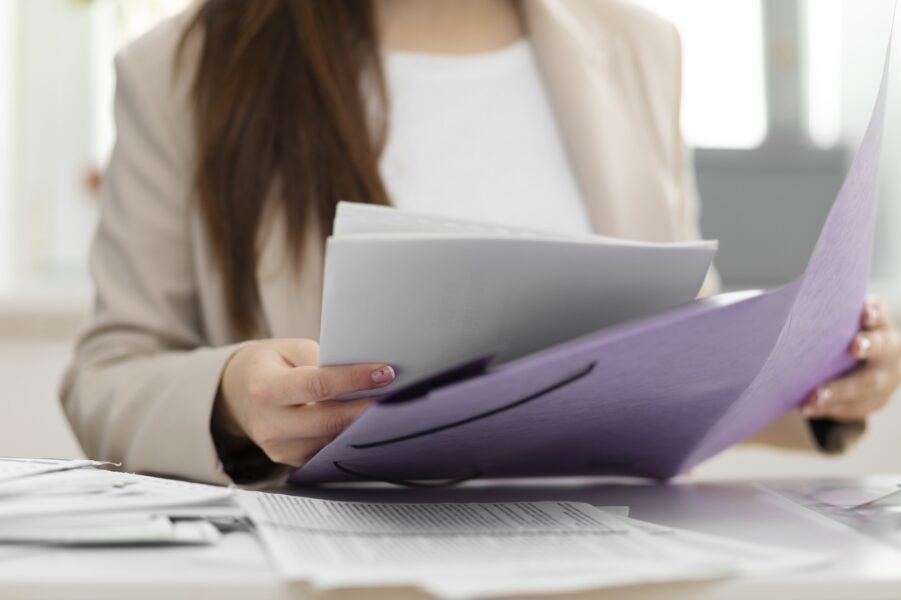 woman preparing michigan divorce documents